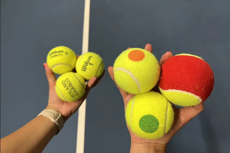 Different type of tennis balls in player's hand