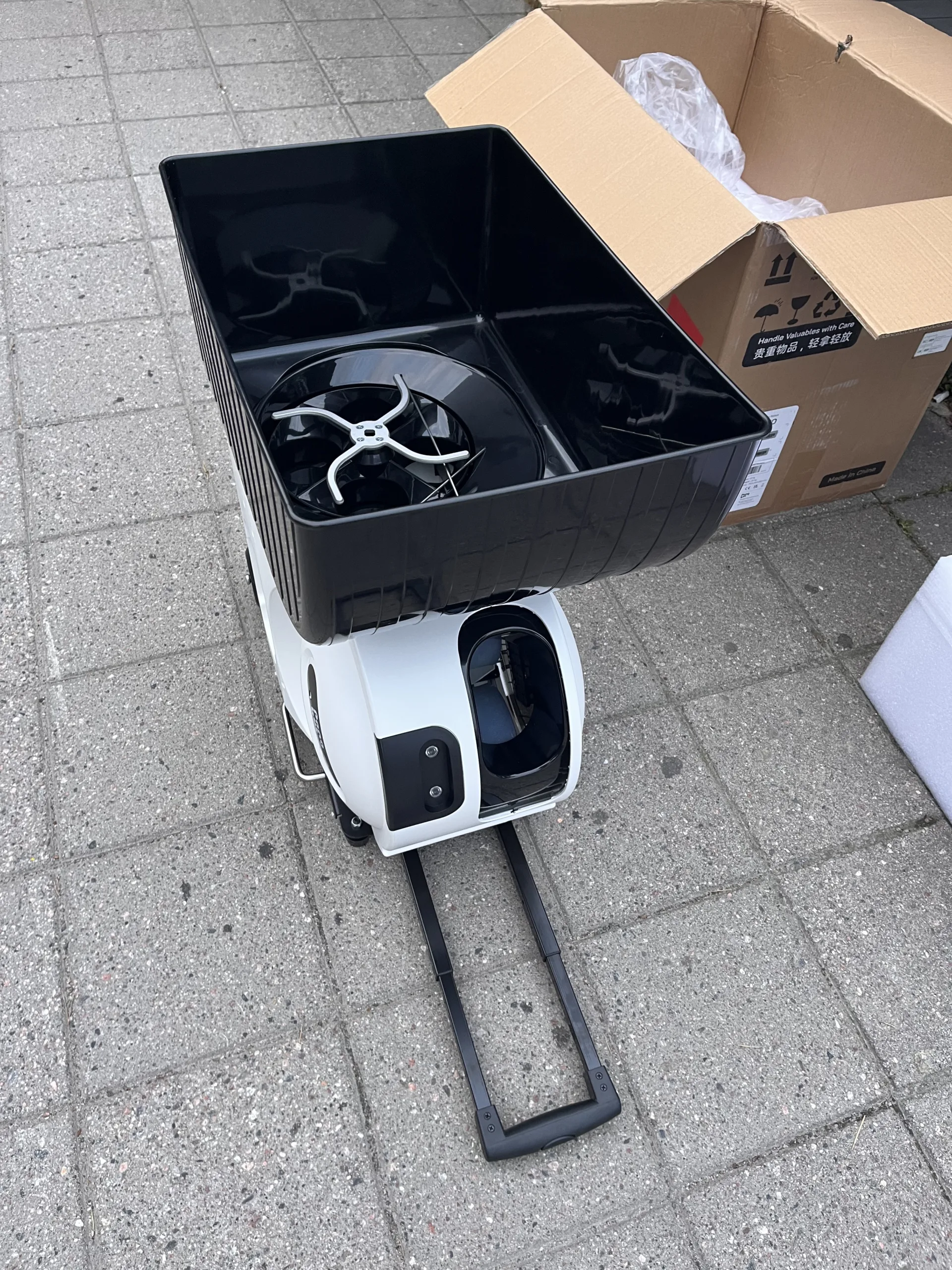Pongbot ball machine and the box